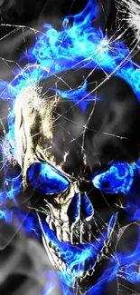 Blue fiery skull with smoke on a dark background.