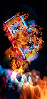 Vibrant mobile wallpaper of a flaming camera and hand.