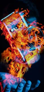 A camera engulfed in striking orange flames on a mobile wallpaper.