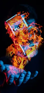 A fiery camera floats above an open blue hand in digital artwork wallpaper.