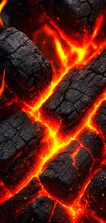 Burning coals with intense flames glowing brightly.