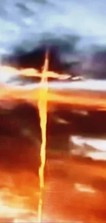 Fiery cross highlighted in a vivid sky.