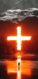 Fiery cross against a dark mountain background with reflection.