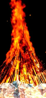 Vibrant bonfire with diamonds and dark background.