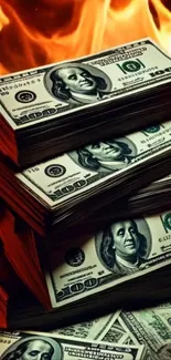 Stacks of dollar bills with flames behind them, creating a dramatic effect.