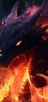 Fiery dragon breathing flames on dark background.