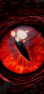 Fiery red monster eye with dark background.