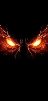 Fiery glowing eyes on dark background