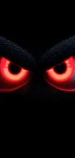 Red glowing eyes on a black background