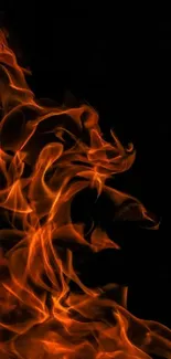 Vibrant fiery flames on a dark background for mobile wallpaper.