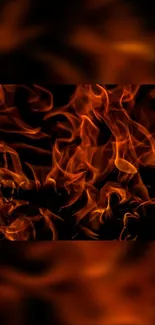 Vibrant orange flames wallpaper with a dark backdrop.