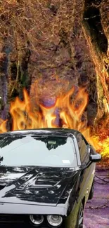 Black muscle car on fiery forest path with blazing flames.