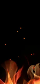 Mobile wallpaper with orange flames popping against a dark background.