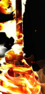 Electric guitar engulfed in fiery flames set against a black background.