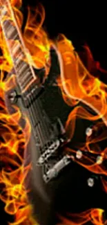 Black electric guitar surrounded by fiery flames on a dark background.