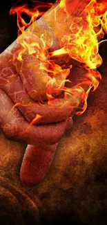 Hand engulfed in vibrant flames with a dark artistic background.