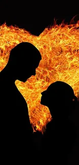 Fiery heart with silhouetted couple, evoking romance.