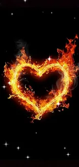 Fiery heart wallpaper with vibrant flames on a black background.