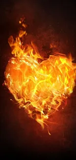 Heart engulfed in vibrant flames on a black background.