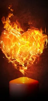 Fiery heart formed above a glowing candle flame.