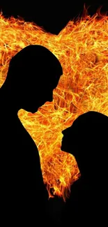 Silhouette of couple with fiery heart background, vibrant and romantic.