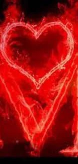 Glowing fiery red heart on a dark background.