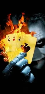 Joker with fiery playing cards on a dark background.