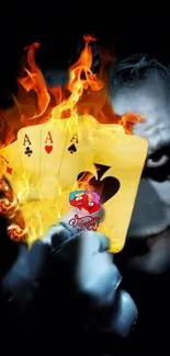 Joker with fiery playing cards on a dark background.