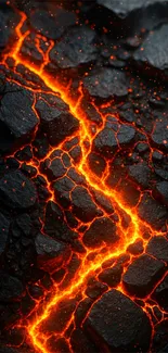 Fiery orange lava flowing through dark rocks.