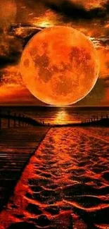 Fiery full moon over a tranquil beach with vibrant orange hues.