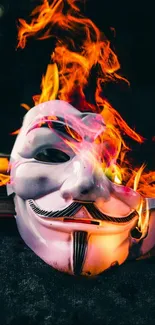 Stylized mask with vibrant flames, set against a dark backdrop.