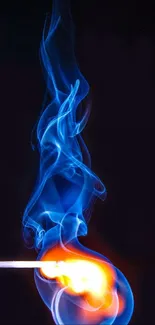 Vibrant blue smoke swirls above a fiery matchstick flame.