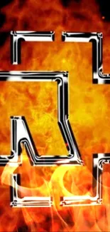 Fiery metal cross with flaming background.