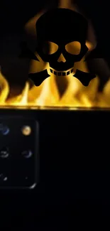 Mobile phone with fiery skull and flames on screen.