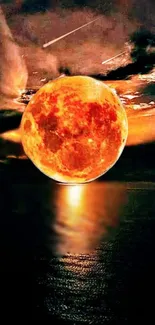 Fiery orange moon reflecting on ocean beneath starry night sky.