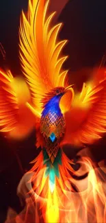 Fiery phoenix with colorful wings in vibrant flames.