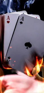 Fiery playing cards with smoke and flames for mobile wallpaper.