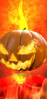 Fiery Halloween wallpaper with a flaming pumpkin.