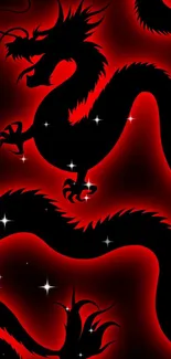 Silhouette of a fiery red dragon on a mobile wallpaper background.