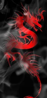 Fiery red dragon on black background with artistic smoke design.