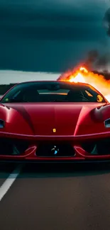 Sleek red sports car with fiery explosion in background.