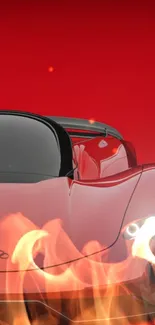 Fiery red sports car with flames and sleek design on wallpaper.