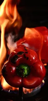 Fiery roasted red peppers over open flame.