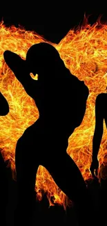 Fiery silhouette dance wallpaper with vibrant orange flames.