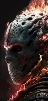 Fiery skull mask surrounded by flames on a dark background.