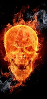 Fiery skull with vivid flames against a dark background wallpaper.