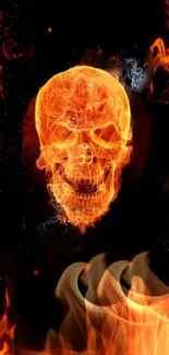 Fiery skull with flames mobile wallpaper, dark background.