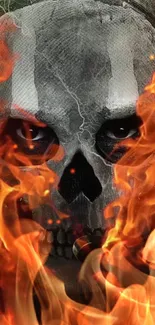 Skull engulfed in orange flames, intense design, mobile wallpaper.