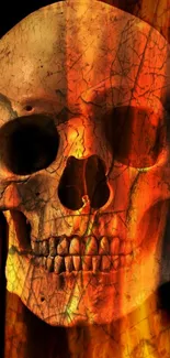 Fiery skull wallpaper with burning flames on a dark background.