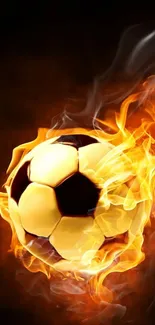 Soccer ball engulfed in vibrant flames against a dark background.